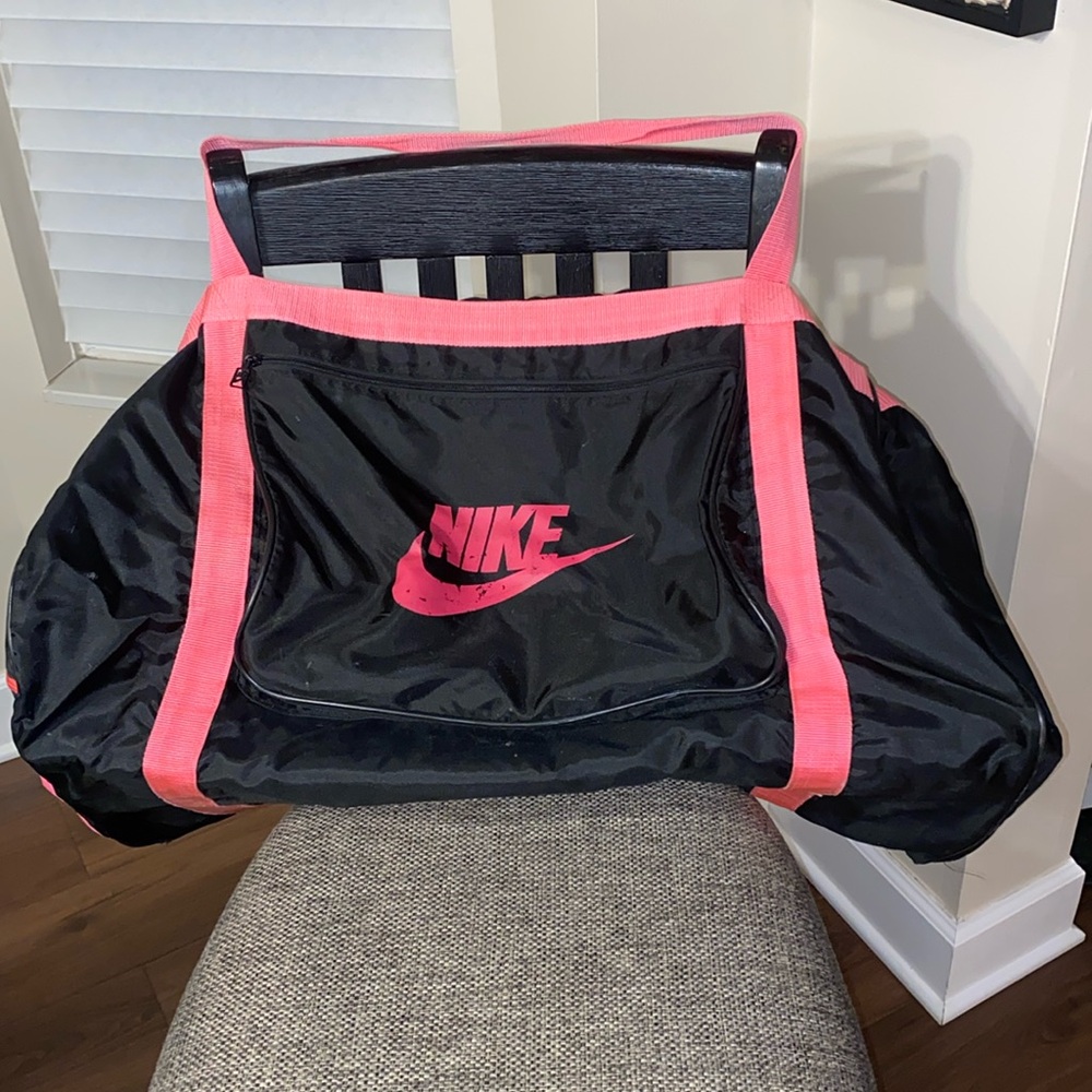 Nike black and hot pink duffel bag 29”x19”x15”
